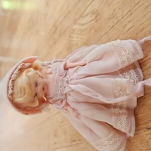 Vintage Storybook doll with pink dress and hood
